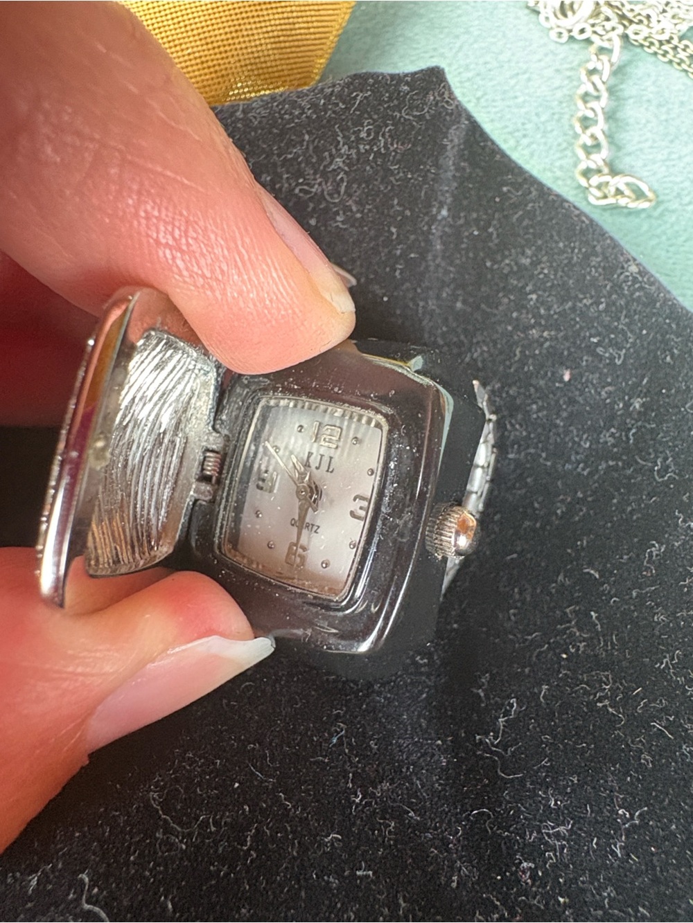 Kenneth Jay Lane Silver Hidden Face Quartz Watch Pendant